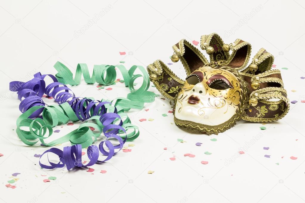 Carnival Venetian mask, confetti and streamers