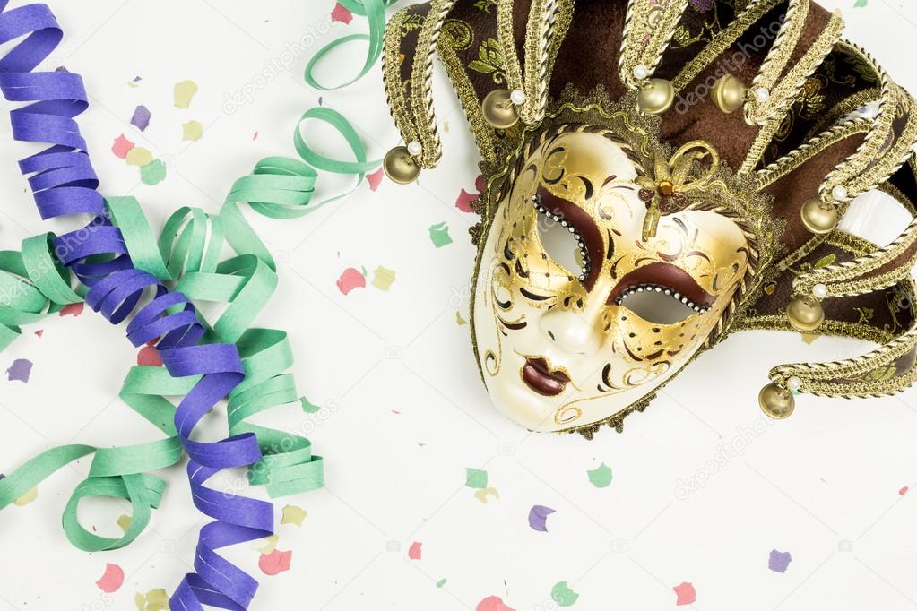 Carnival Venetian mask, confetti and streamers