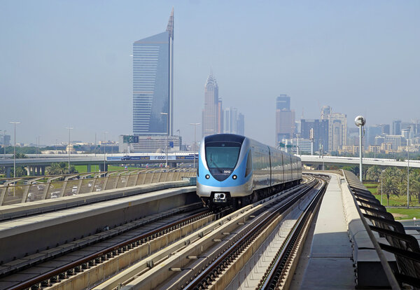 DUBAI, UAE - JUNE 2015 : Dubai Metro. A view of the city from the subway car  Dubai Metro as world's longest fully automated metro network (75 km) on June 16, 2015  Dubai, UAE.