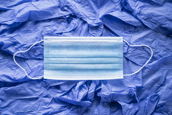 Covid 19医療外科用フェイスマスク 使い捨て手袋の背景にコロナウイルスの口の保護 — ストック写真