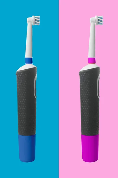 Elektronische Tandenborstel Geïsoleerd Blauwe Roze Achtergrond — Stockfoto