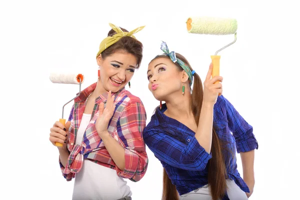 Two fun girls are going to do painting walls. — Stock Photo, Image