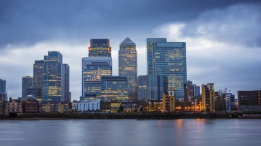 Canary Wharf, London's major financial district at blue hour clipart
