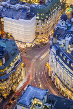 Aerial view of a busy street of central London at blue hour - England, UK clipart