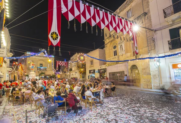 Mosta, Malta - 15 Aug. 2016: The Mosta festival at night with celebrating maltese people. — Stock Photo, Image