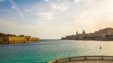 The harbor of Malta in the morning clipart