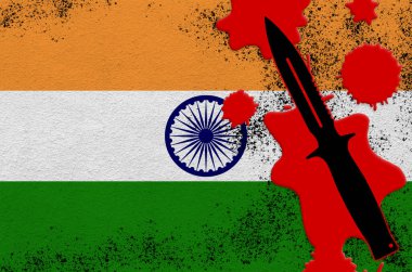 Hindistan bayrağı ve kırmızı kanla siyah taktik bıçağı. Ölümcül sonuçları olan terör saldırısı ya da askeri operasyonlar kavramı. Tehlikeli arbede silahı kullanımı