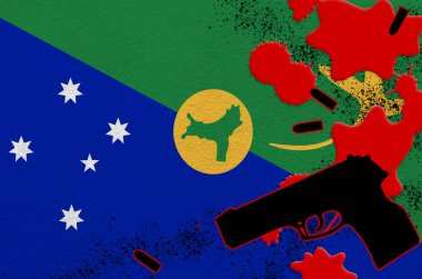 Noel adası bayrağı ve kırmızı kanla siyah ateşli silah. Ölümcül sonuçları olan terör saldırısı ya da askeri operasyonlar kavramı. Tehlikeli silah kullanımı.