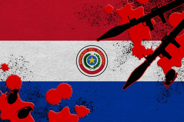 Paraguay flag and rocket launchers with grenades in blood. Concept for terror attack and military operations. Gun trafficking
