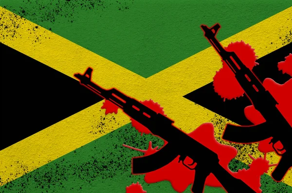 牙买加国旗和两支红血型黑色Ak 47步枪 恐怖袭击或具有致命后果的军事行动的概念 危险武器的使用 — 图库照片