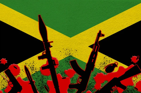 牙买加国旗和各种红血武器 恐怖袭击或具有致命后果的军事行动的概念 枪支贩运 — 图库照片