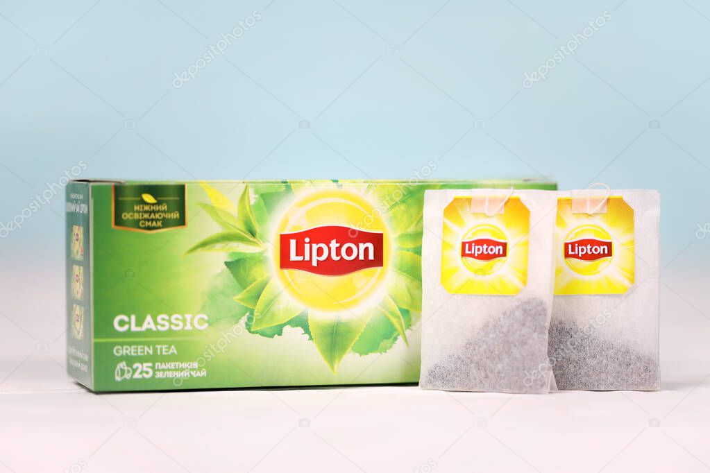 KHARKOV, UKRAINE - DECEMBER 8, 2020: Lipton classic green tea bags. Lipton is a British brand of tea owned by Unilever and PepsiCo company