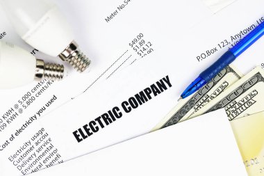 Soyut Amerikan elektrik faturası. Enerji tasarrufu yaparak tasarruf kavramı ampuller ve elektrik faturası faturasına yol açtı