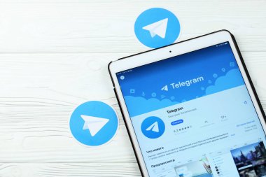 KHARKOV, UKRAINE - FEBRUARY 14, 2021: Telegram app in app store market on ipad display screen. Telegram is a freeware cross platform cloud based instant messaging IM software and application service