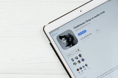KHARKOV, UKRAINE - FEBRUARY 14, 2021: Clubhouse app in app store market on ipad display screen. Clubhouse is invitation only audio chat iPhone app launched in April 2020