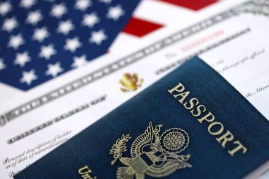 US Certificate of Naturalization with US flag and Passport close up