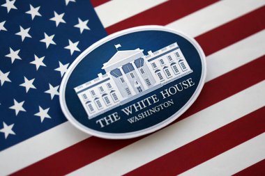 KYIV, UKRAINE - SEPTEMBER 17, 2025 The White House Washington badge on United States of America flag close up
