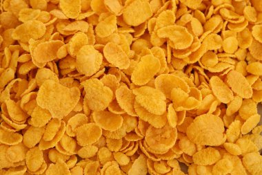 Mısır gevreği arkaplanı yakın plan. Sabah kahvaltısı için mısır gevreği kutusu.