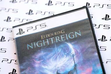 KYIV, UKRAINE - SEPTEMBER 8, 2025 Elden Ring Nightreign videogame lies on white banner with PlayStation 5 logotypes close up