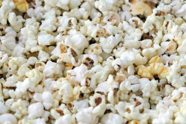 Patlamış mısır dokusu arka planı. Örnek olarak büyük miktarda patlamış mısır.