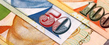 Singapore Dollar currency money bills. SGD currency banknotes in bunch with different denomination close up