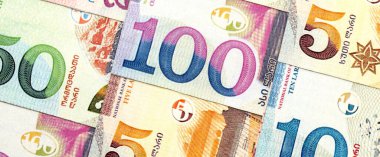 Georgian Lari currency money bills. GEL currency banknotes in pile with different denomination close up