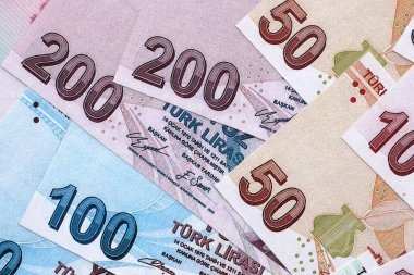Turkish Liras currency money bills. TRY currency banknotes in pile with different denomination close up