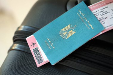 Egyptian passport and avia tickets on travel bag close up. The concept of travel and vacation
