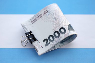 Arjantin pezosu büyük miktarda Arjantin bayrağına yakın duruyor. Finans ve bankacılık kavramı