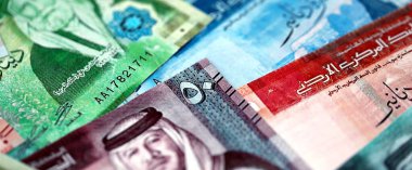 Jordanian Dinar currency money bills. JOD currency banknotes in big amount with different denomination close up