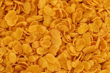 Mısır gevreği arkaplanı ve dokuyu kapatır. Sabah kahvaltısı için mısır gevreği kutusu.