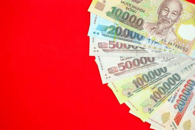 Vietnam dong para faturaları büyük miktarda kırmızı yakın. Finans ve bankacılık kavramı