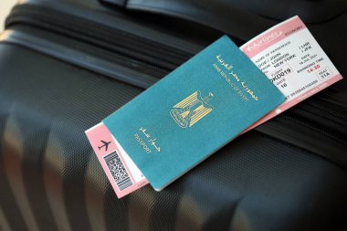 Egyptian passport and avia tickets on travel bag close up. The concept of travel and vacation