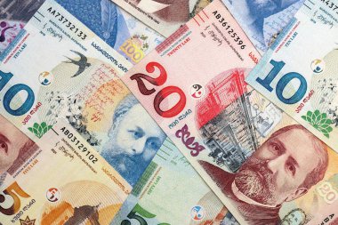 Georgian Lari currency money bills. GEL currency banknotes in pile with different denomination close up