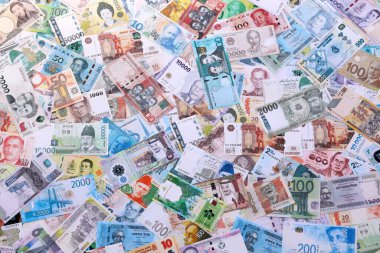 Farklı ülkelerden gelen para. Çeşitli para birimlerinin birçok rastgele banknotları. Büyük meblağda nakit. Döviz Borsası kavramı