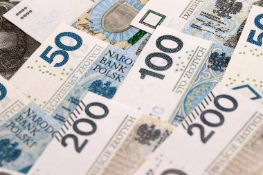 Büyük miktarda Polonyalı zloti para banknotları kapanıyor. Büyük miktarda Polonya parası yığını. Polonya 'da iş, ekonomi ve yatırım kavramı