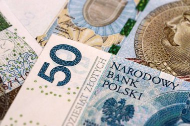 Büyük miktarda Polonyalı zloti para banknotları kapanıyor. Büyük miktarda Polonya parası yığını. Polonya 'da iş, ekonomi ve yatırım kavramı