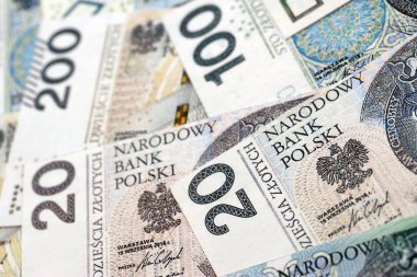 Büyük miktarda Polonyalı zloti para banknotları kapanıyor. Büyük miktarda Polonya parası yığını. Polonya 'da iş, ekonomi ve yatırım kavramı