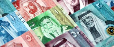 Jordanian Dinar currency money bills. JOD currency banknotes in big amount with different denomination close up