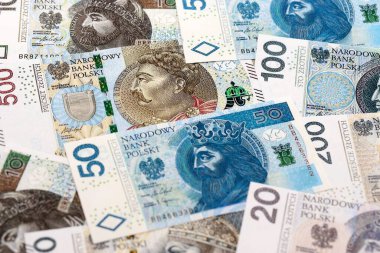 Büyük miktarda Polonyalı zloti para banknotları kapanıyor. Büyük miktarda Polonya parası yığını. Polonya 'da iş, ekonomi ve yatırım kavramı