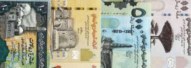 Yemenli riyal kağıt banknotları masaya yığılır. Yemen YER para birimi faturaları büyük miktarda. Yemen 'de ekonomi, vergi ve bankacılık kavramı