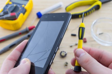 Asker işyeri. Smartphone onarım.