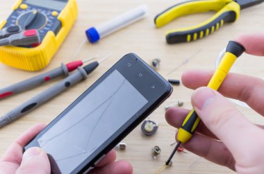 Asker işyeri. Smartphone onarım.