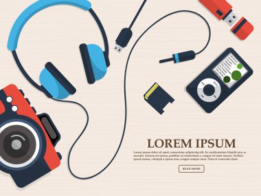 Reklam için fotoğraf makinesi, flash kart ve kulaklık alan içeren bir tablo gadget kümesi. Vektör