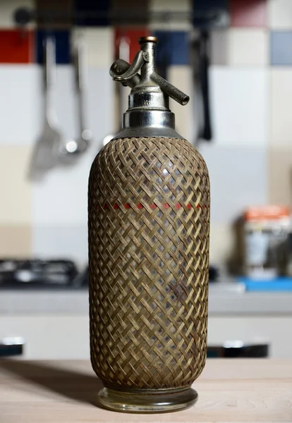 Vintage seltzer bottle on table — Stock Photo, Image