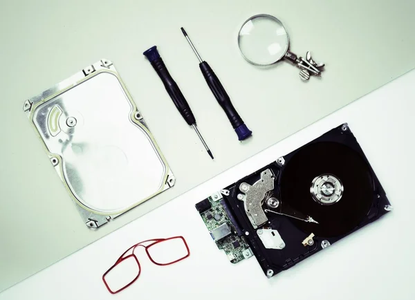 Flat lay - hard disk repair accessories — Stock Photo, Image