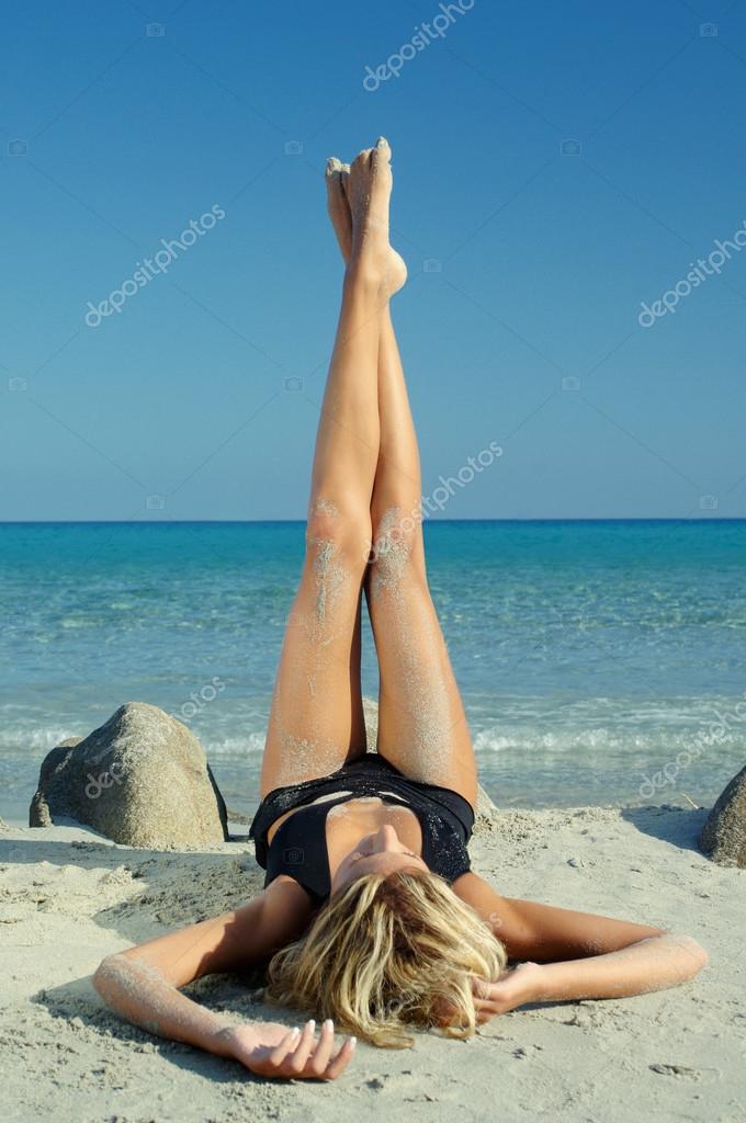 Legs open at beach