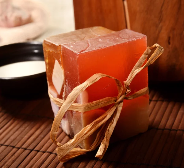 Spa still life with soap, bath salt, cream,towel,candles Stock Picture