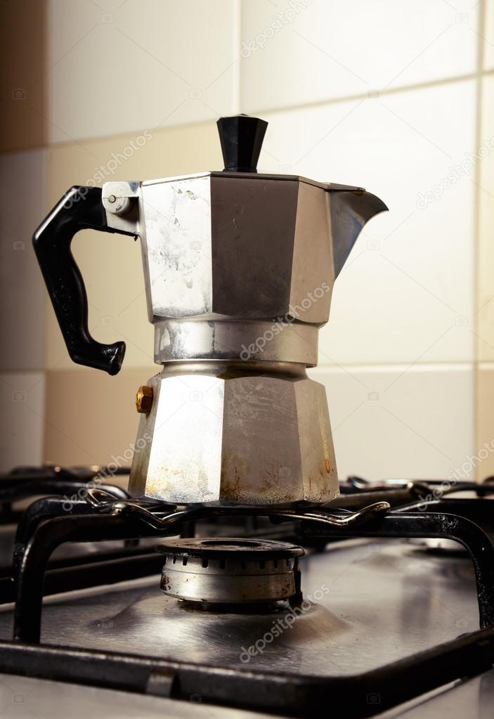 Moka Coffee Maker Pot On Gas Stove. Stock Photo, Picture and