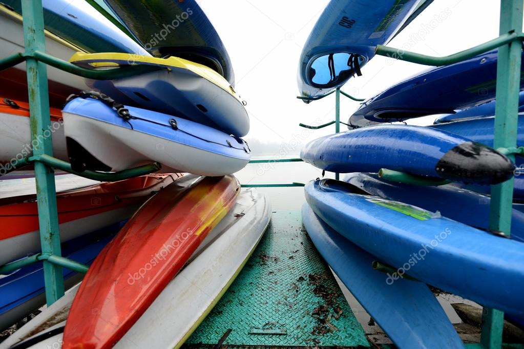 Colorful Kayaksand canoes in a Row